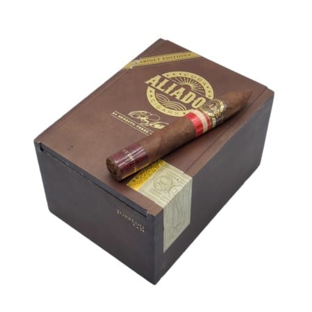 The Cuba Aliados cigar made by Ernesto Perez Carillo is a limited-edition cigar crafted at his La Alianza factory in the Dominican Republic.  They use an Ecuadorian Sumatra wrapper that has been aged for five years and uses fillers from Nicaragua as well as the Dominican Republic. This production was limited to 15,000 boxes total, with only 10,000 of them making their way to the U.S.A. This cigar has aromas of creamy oak, leather, freshly brewed coffee, tobacco, earth, and sweet bread. While smoking you will enjoy distinct leather and earth flavors combined with cedar, cinnamon, almonds, cocoa nibs, and light citrus peel.