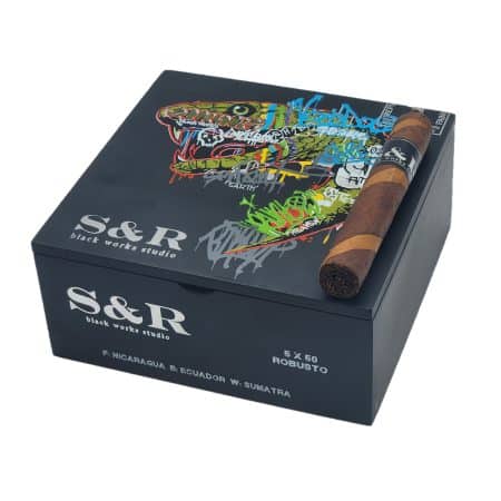 The Black Works Studio S&R returns for the first time since 2020 with a new barber pole design that is created with a dark Sumatra wrapper grown in Indonesia. They use a lighter leaf from an Ecuadorian Connecticut shade-grown wrapper. Underneath is an Ecuadorian Habano binder, and fillers from Nicaragua as well as the Dominican Republic. They are medium-strength cigars with a flavor profile that combines herbal citrus notes with cocoa and a complex mix of chili & white pepper spice. Only 950 boxes of each size have been produced.